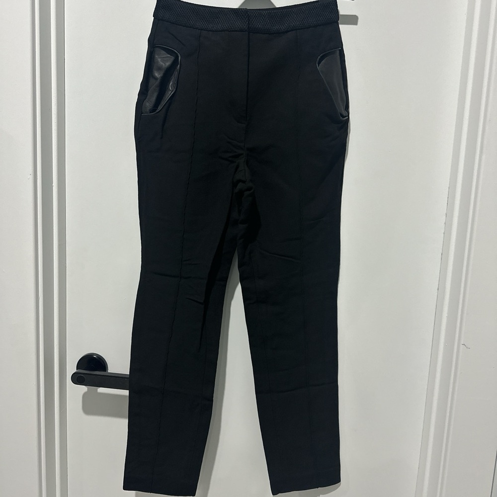 ALEXANDER WANG PANTS WITH LEATHER POCKET DETAIL
